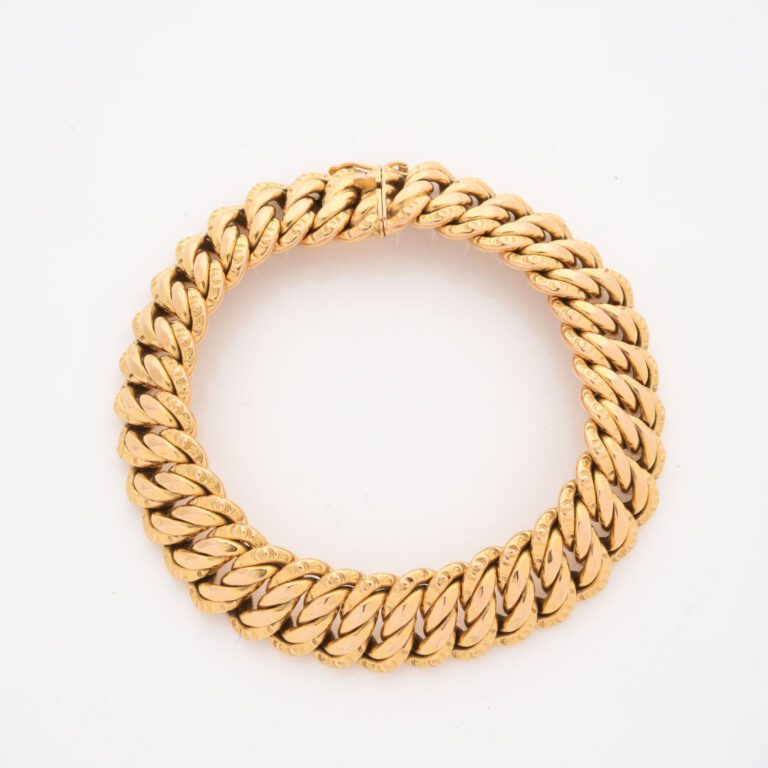 Bracelet souple en or jaune (750) à maille américaine - Fermoir cliquet et huit…