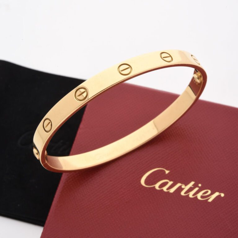 CARTIER - Bracelet rigide ouvrant modèle Love en or jaune (750) décoré de motif…