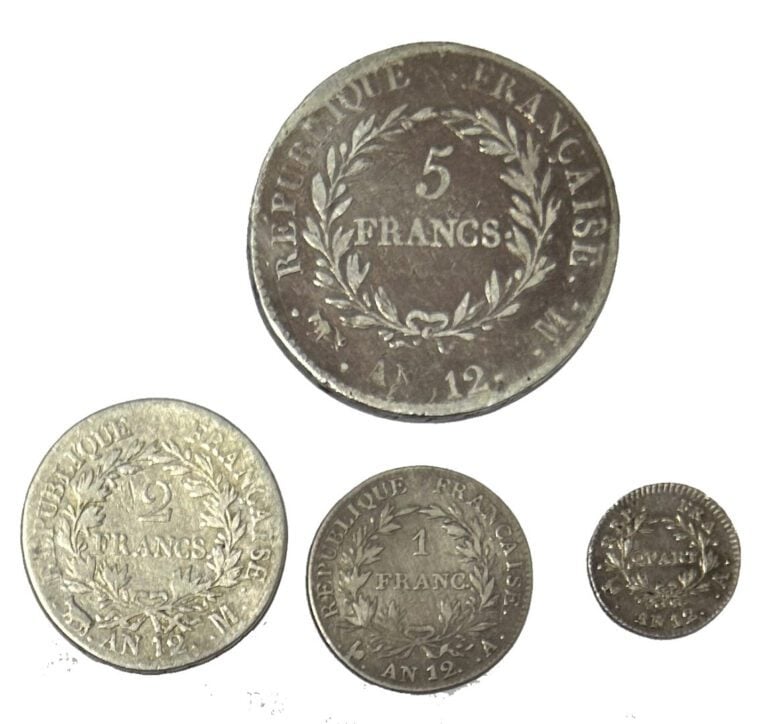 France - Napoléon Ier (1804-1815) - Lot de quatre monnaies comprenant : - -Une…