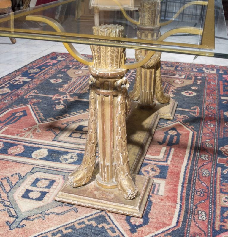 Deux carquois en bois doré XVIIIème formant piétement d'une table basse à plate…