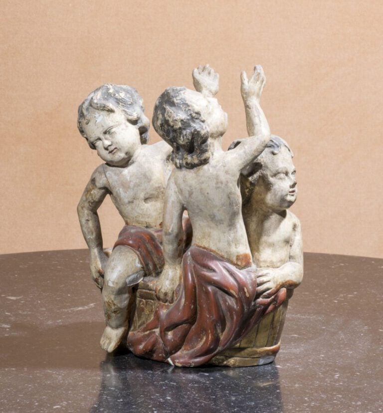 "Enfants au saloir" - groupe en bois sculpté polychromé reposant sur une consol…