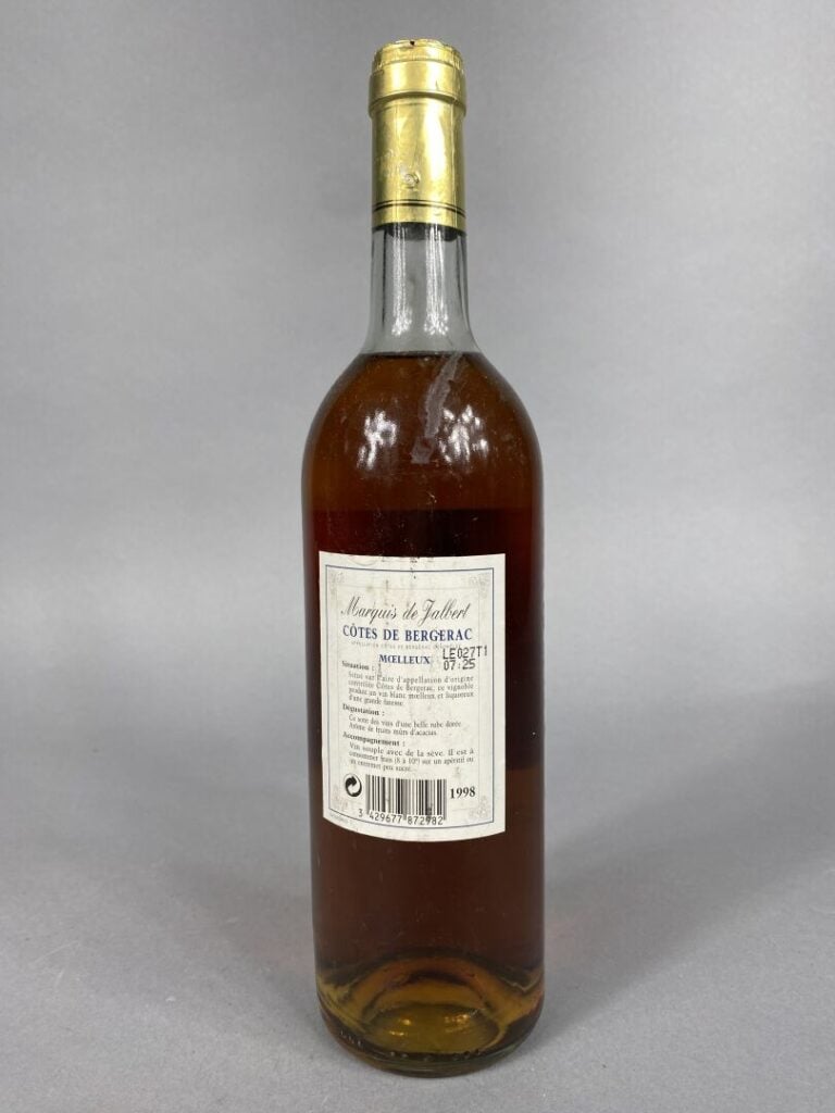 Ensemble de quatre bouteilles comprenant : - - Château Saint-Jean, Sainte Croix…