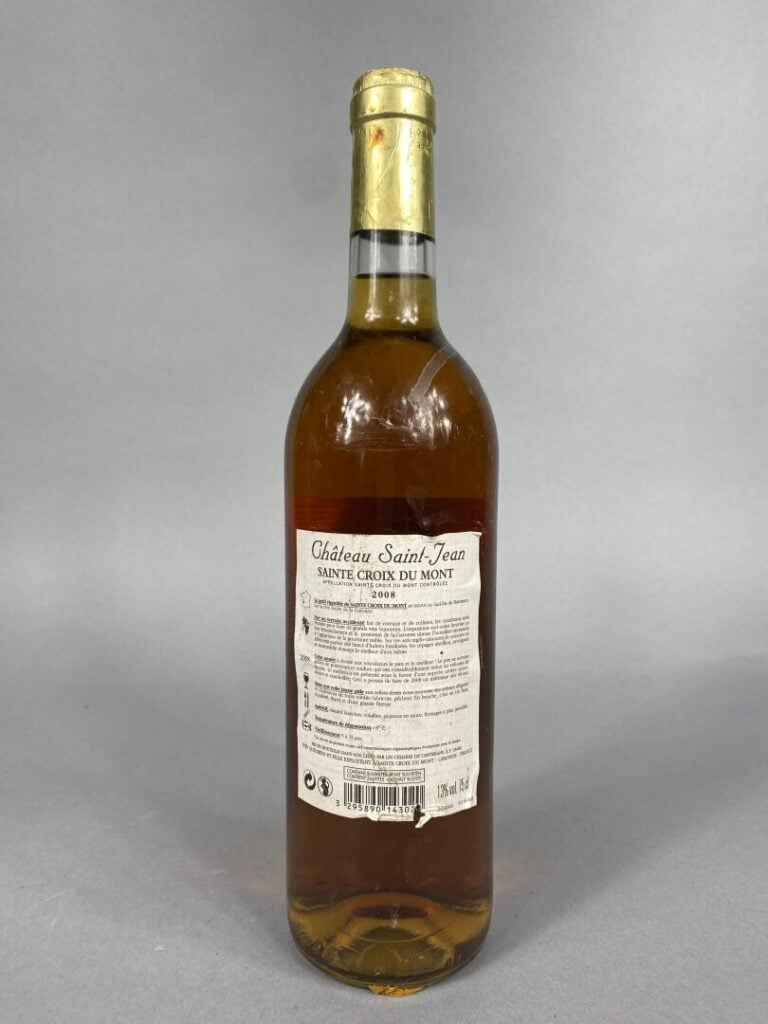 Ensemble de quatre bouteilles comprenant : - - Château Saint-Jean, Sainte Croix…