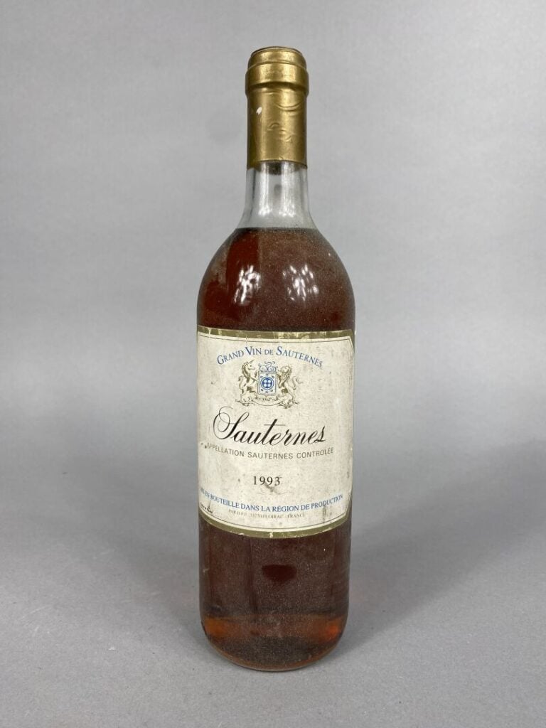 Ensemble de quatre bouteilles comprenant : - - Château Saint-Jean, Sainte Croix…