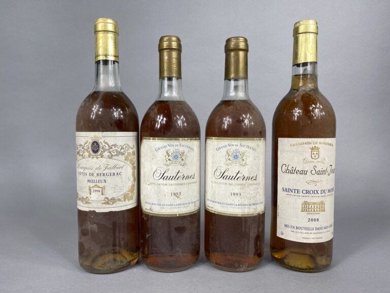 Ensemble de quatre bouteilles comprenant : - - Château Saint-Jean, Sainte Croix…
