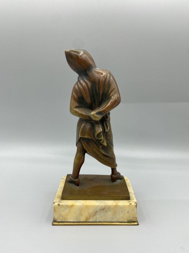 Sujet enfant en bronze patiné H (avec socle) : 21 cm