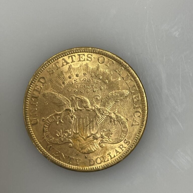 Une pièce de 20 Dollars en or (900‰) "Liberty Head - Double Eagle" - 1877 - 33.…