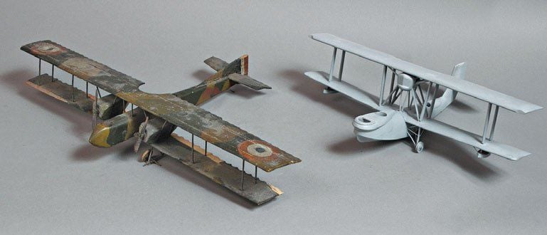 (a, b) « CAMS 37 » modèle de construction ancienne, en bois peint, posé sur son train, L 32 x 37 cm, repeint + « Caudron R 11 », modèle artisanal en bois peint posé sur son train, L 34 x E 52 cm, 70%