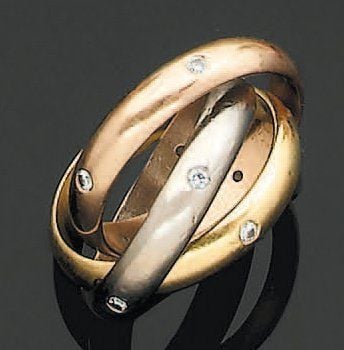 ALLIANCE composée de trois anneaux, trois ors sertis de diamants de taille brillan