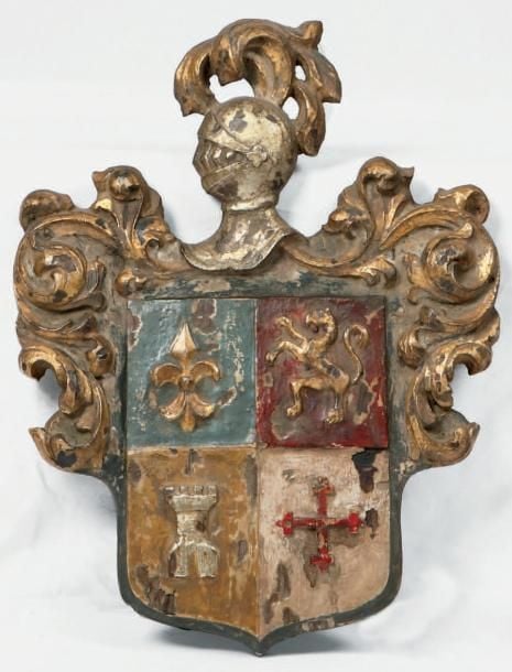 Armoiries en bois sculpté, doré et polychrom