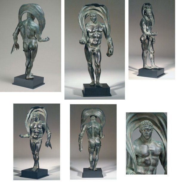 ATHLÈTE Superbe statuette d'athlète, debout, pied gauche en avant, le bras droit plié, le gauche à l'écart du corp