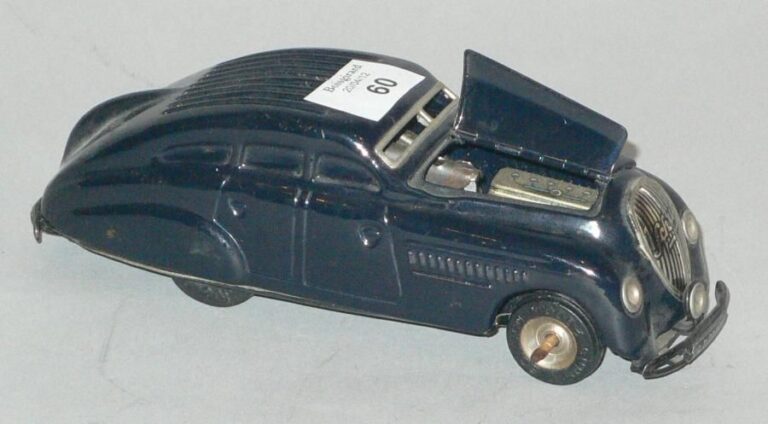 Auto Kommando SCHUCO 1936, en tôle peinte noire à mécanisme d'horlogeri