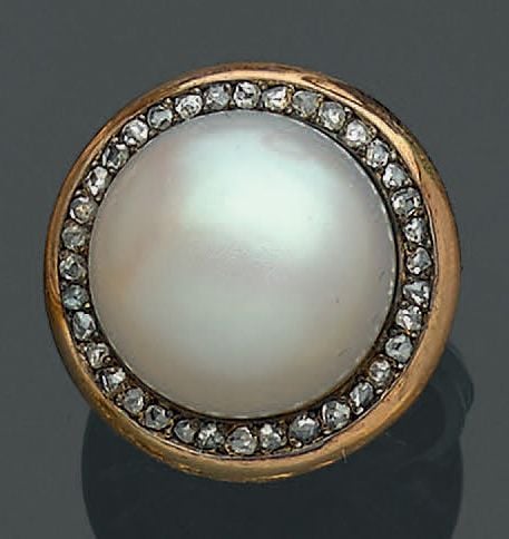 BAGUE circulaire en or rose (750 millièmes) et argent (mi