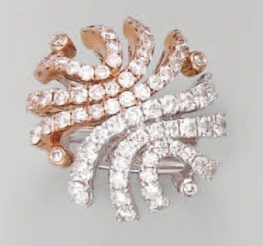 BAGUE circulaire en or rose et or gris ajouré serti d'alignements de diamants taille brillan