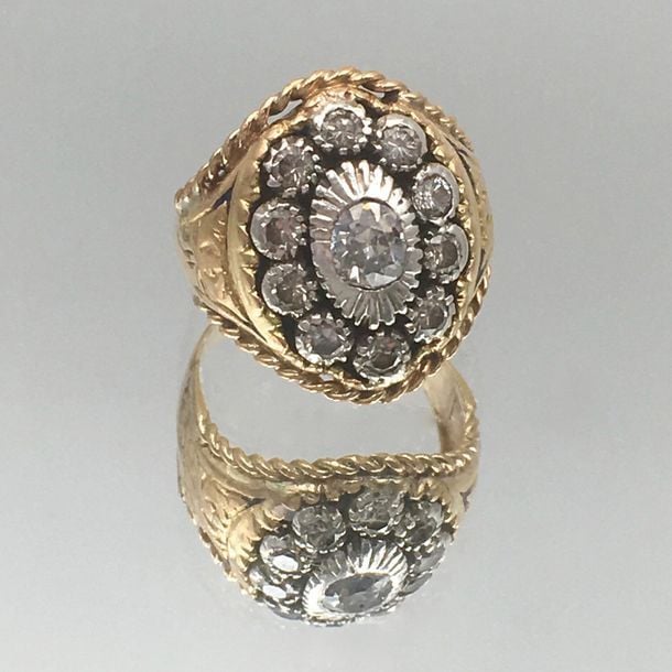BAGUE en or jaune (750 millièmes) et argent (mi