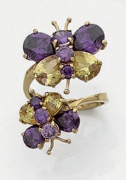 BAGUE ouverte «papillons» en or jaune (750 millièmes) serti d'améthystes et citrine