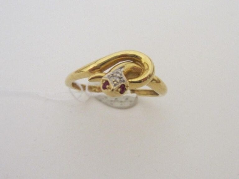 BAGUE «serpent» en or jaune et or gris (750 millièmes