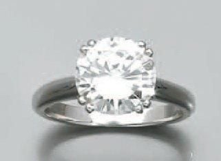 BAGUE solitaire en or gris serti d'un diamant taille brillant pesant 3,02 c