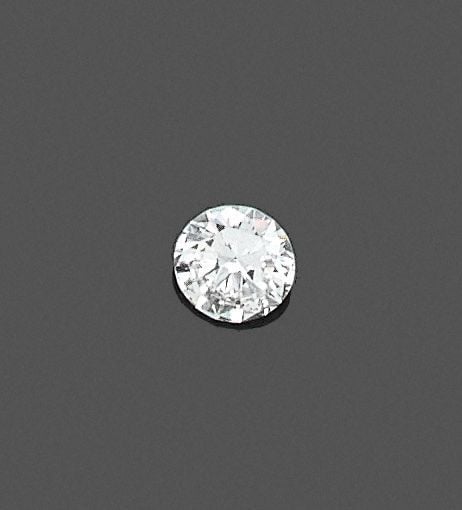 •BAGUE «solitaire» en platine (950‰) et or gris (750‰) serti d'un diamant taille brillant pesant 1,18 carat