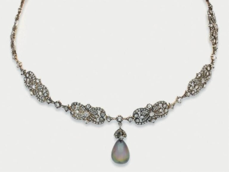 Beau COLLIER articulé en or gris (750 millièmes) et argent (mi