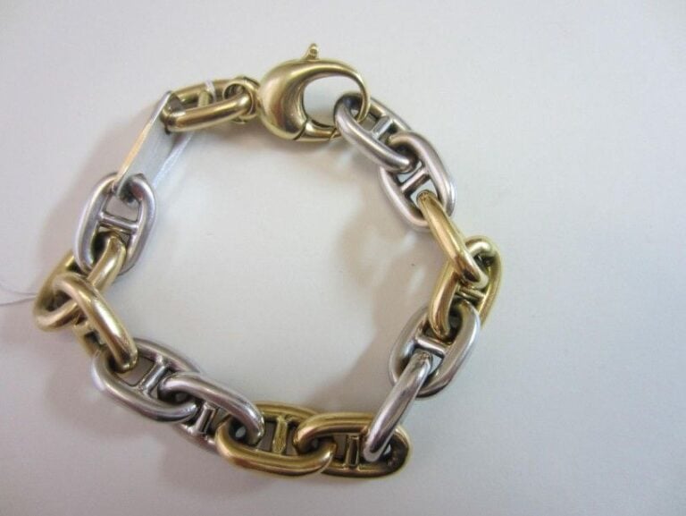 BRACELET «chaîne ancre» en or jaune et or gris (750 millièmes
