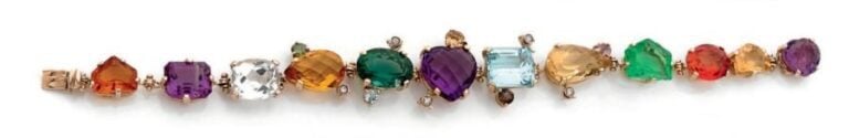 BRACELET en or jaune 9 carats (375 millièmes) serti de pierres précieuses de couleur et diamants taille brillan