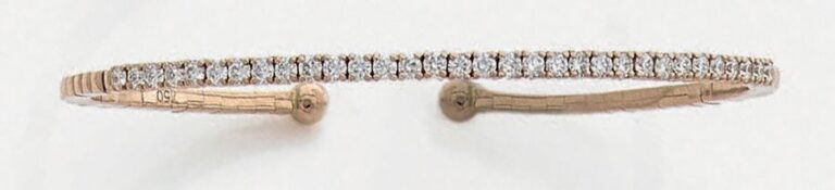 BRACELET fin ouvert or rose (750 millièmes) légèrement flexible, partiellement serti d'un alignement de diamants taille brillan