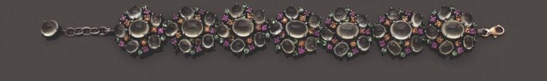 BRACELET «fleurs» en argent noirci (925 millièmes) serti de préhnites cabochons, saphirs jaunes et rose