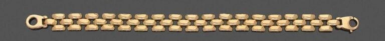 •BRACELET «godrons» en or jaune (750‰) articulé et ajour