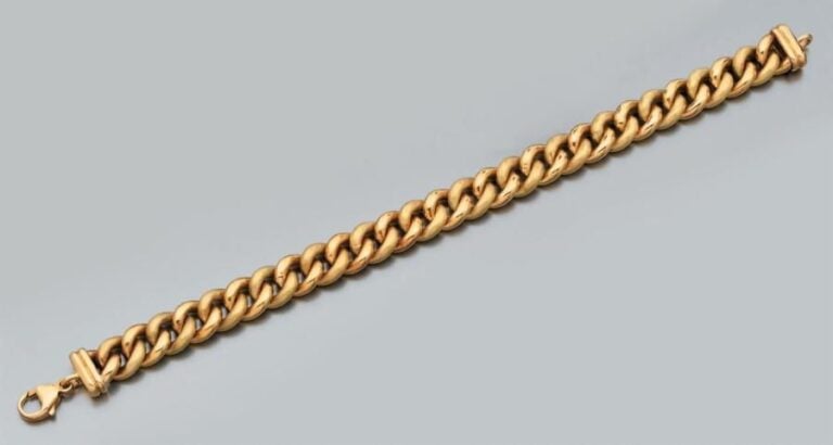 BRACELET «gourmette» en or jaune partiellement dépol