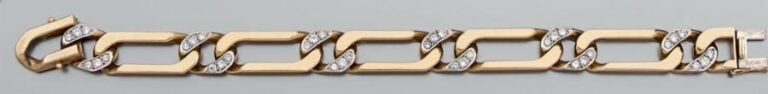BRACELET «gourmette limée» en or jaune à maille alternée partiellement serti de diamant