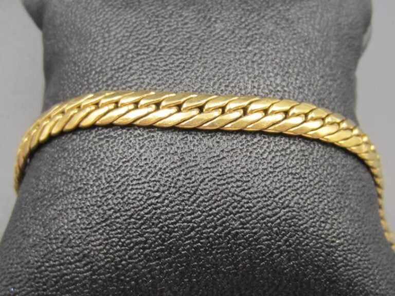 BRACELET «gourmette plate» en or jaune (750 millièmes