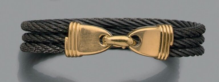 BRACELET, modèle «Force 10», en or jaune (750 millièmes) godronnés et trois «câbles» torsadés en acie