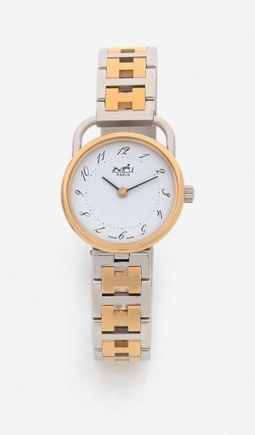 BRACELET MONTRE «Arceau» ronde de dame, en acier et métal dor