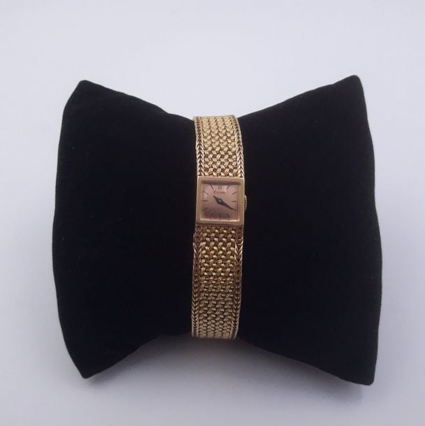 BRACELET MONTRE carrée de dame en or jaune (750 millièmes
