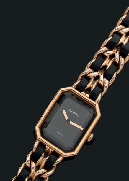 BRACELET MONTRE de dame en métal doré, modèle «Première