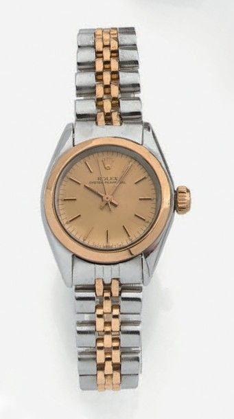 BRACELET MONTRE de dame en or jaune (750 millièmes) et acier, modèle «Oyster Perpetual
