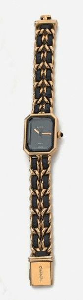 BRACELET MONTRE de dame octogonale en métal doré, modèle «Première