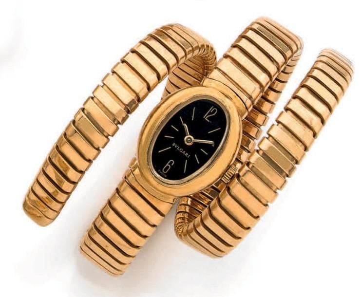 BRACELET MONTRE de dame ovale en or jaune (750 millièmes), modèle «Serpenti