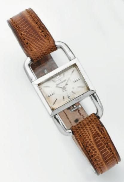 BRACELET MONTRE de dame rectangulaire en acier ajouré, modèle «Étrier