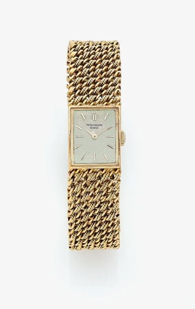 •BRACELET MONTRE de dame rectangulaire en or jaune (750‰