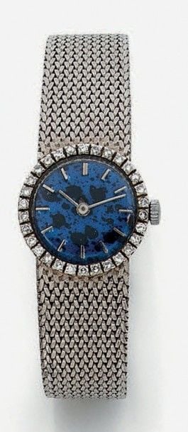 BRACELET MONTRE de dame ronde en or gris (750 millièmes