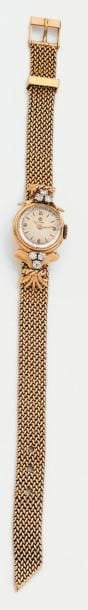 BRACELET MONTRE de dame ronde en or jaun