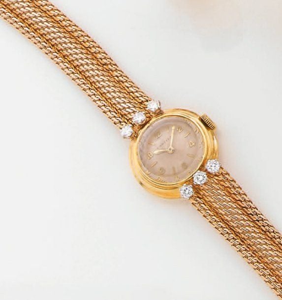 BRACELET MONTRE de dame ronde en or jaun