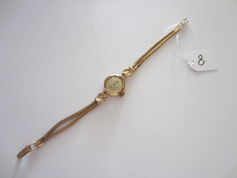BRACELET MONTRE de dame, ronde, en or jaun
