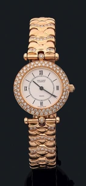 BRACELET MONTRE de dame ronde en or jaune (750 millièmes
