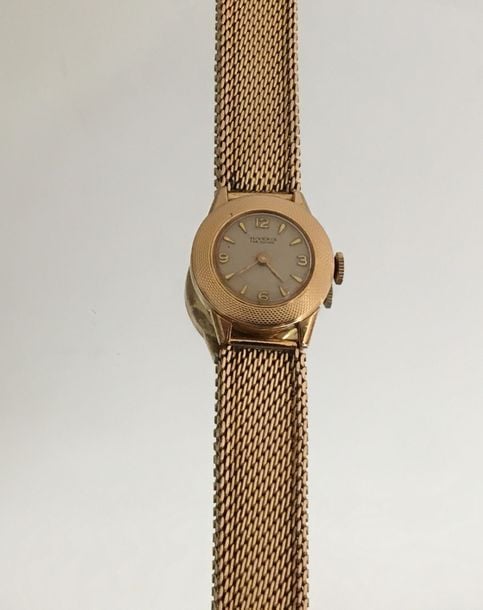BRACELET MONTRE de dame ronde en or rose (750 millièmes