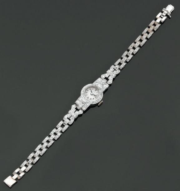 BRACELET MONTRE de dame ronde en platine et or gri