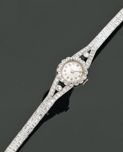 BRACELET MONTRE de dame ronde en platine et or gri