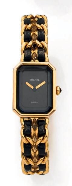 BRACELET MONTRE octogonale en métal doré, modèle «Première